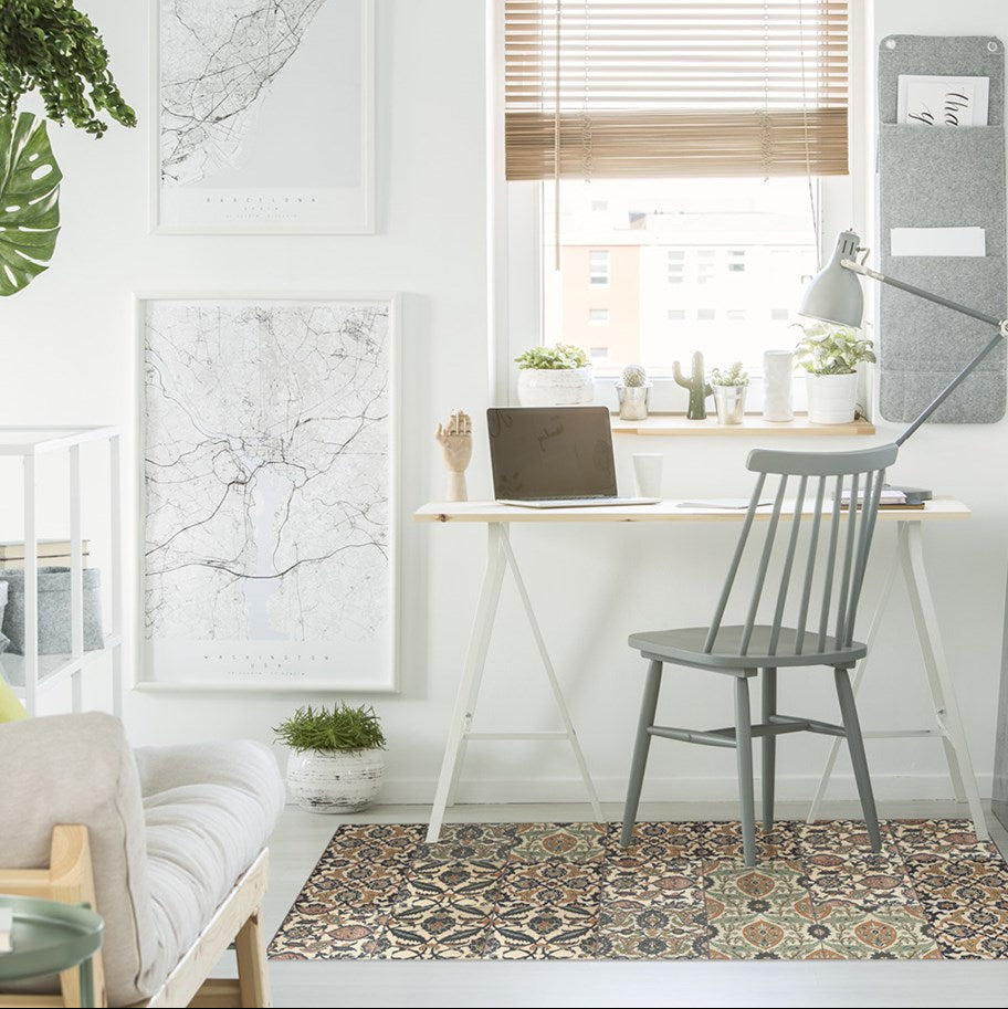 Beija Flor vinyl rug Armenian Patchwork placed on the floor in a styled indoor setting.
