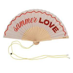 Fisura hand fan shown open, featuring  "summer love" design on bamboo ribs with a cord
