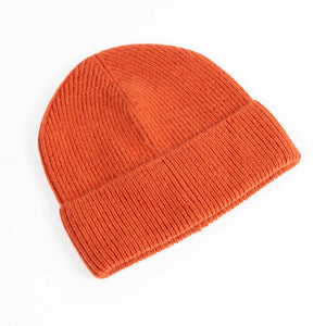 Burnt orange ribbed beanie in soft cashmere blend, folded cuff