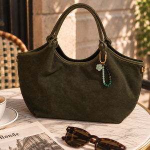 Gemstone Key Ring in Loop Green styled on Hector Suede handbag in Khaki