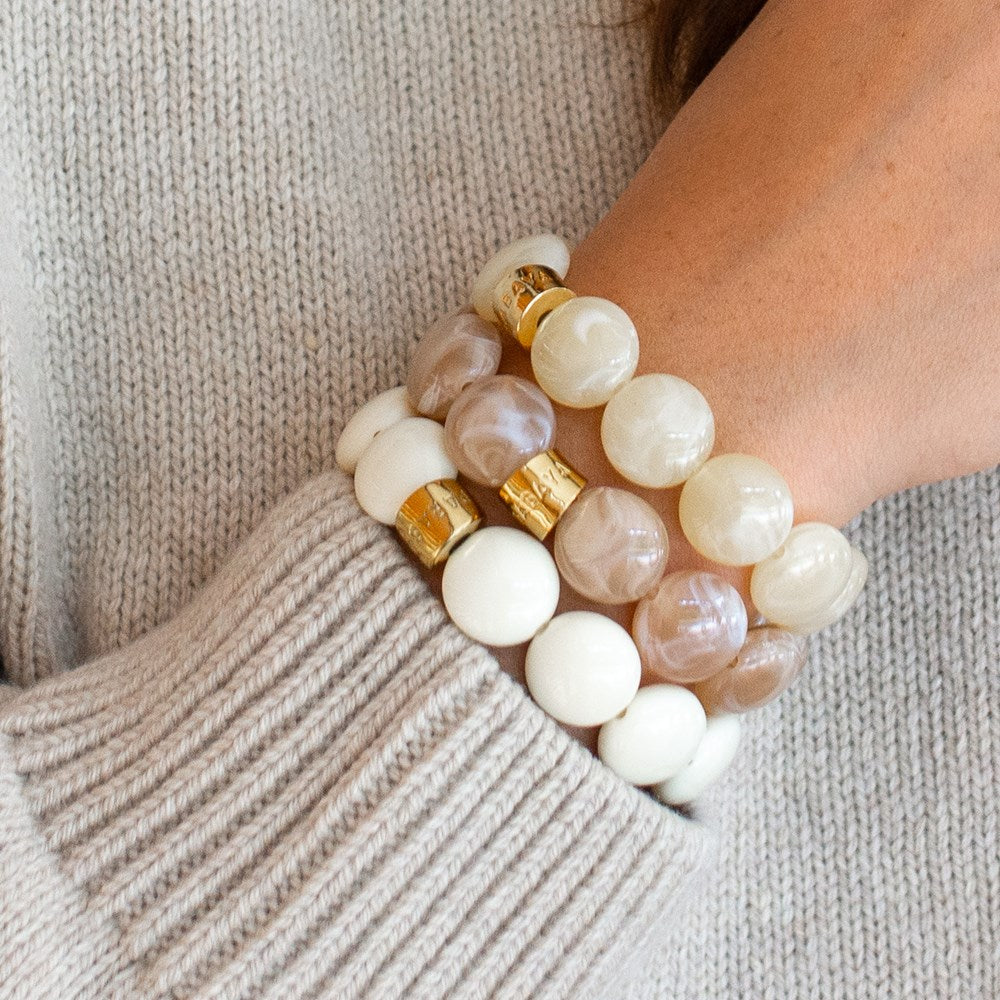 Parabaya Bombom Ivory bracelet in soft ivory resin with gold-plated detail. 