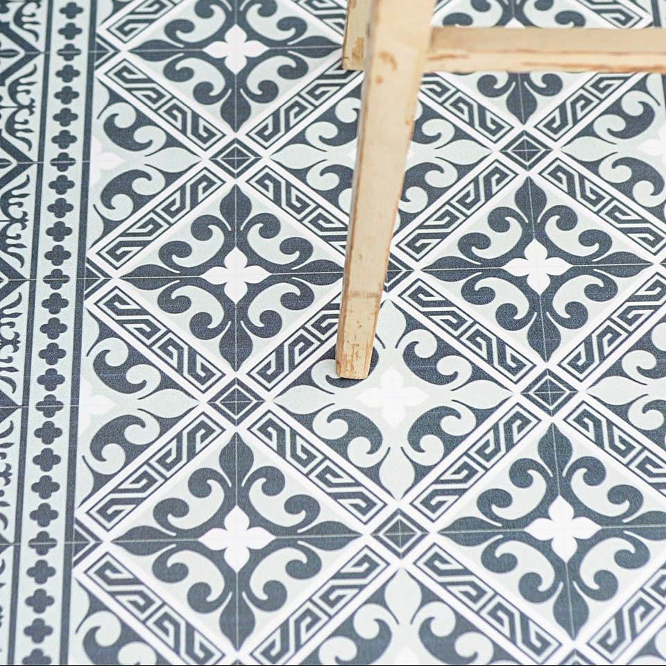 detail of BEIJA FLOR Vinyl Rug- Flor de Lis Gray