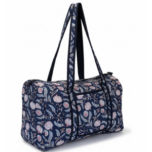 VOYAGE Carla weekender bag in navy floral block-print quilted cotton