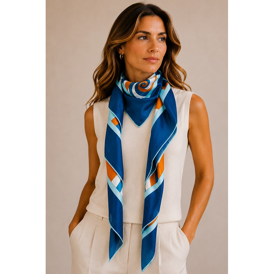 Woman wearing the MAISON FANLI Astro Scorpio cotton and silk scarf 140x140cm with multicolour zodiac design