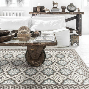 Beija Flor vinyl rug Mountain placed on the floor in a styled indoor setting.
