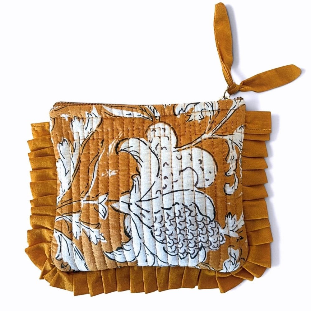 VOYAGE Sasha mini ruffle pouch in mustard floral block-print quilted cotton with knotted zip pull