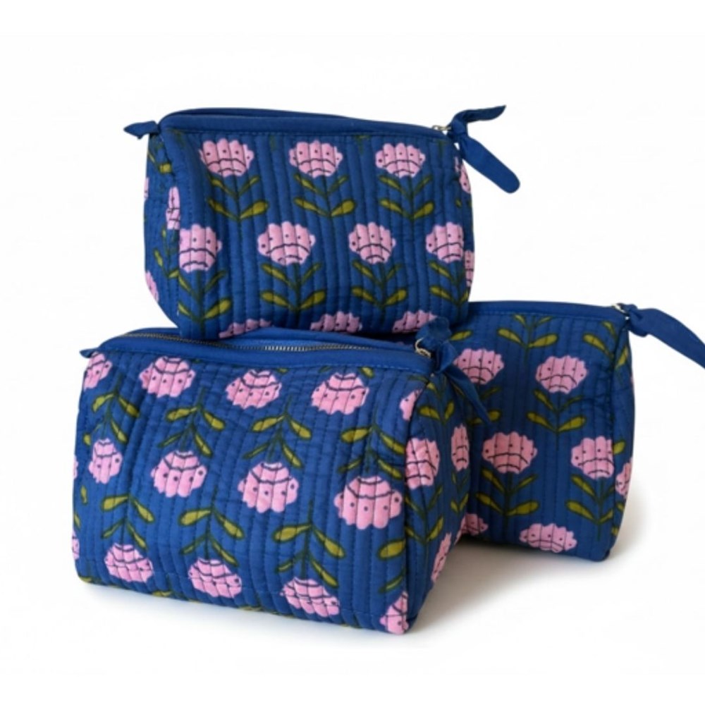 VOYAGE Tali set of 3 toiletry and makeup bags in navy and pink floral block-print quilted cotton