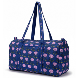 VOYAGE Tali weekender bag in navy and pink floral block-print quilted cotton