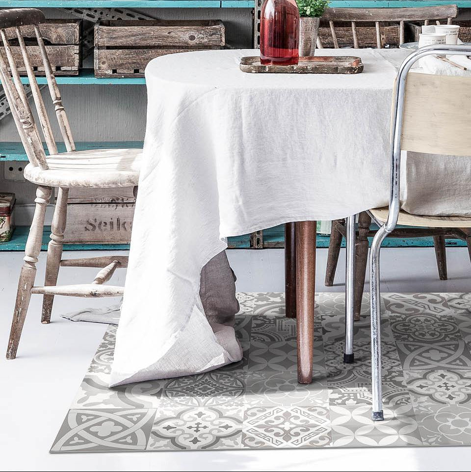 Beija Flor vinyl rug 'eclectic Natural Antique' placed on the floor in a kitchen
